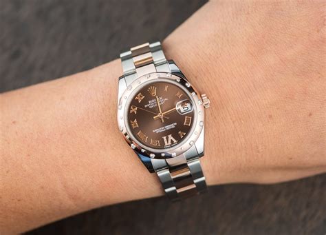 31mm rolex on mans wrist